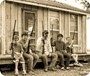 I don't remember if this was a staged picture with my sons and nephews or not. Hillbilly boys on the old cabin before we tore it down!